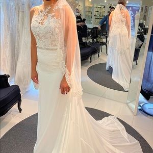 Never used wedding dress. It has a lace top and its very comfortable